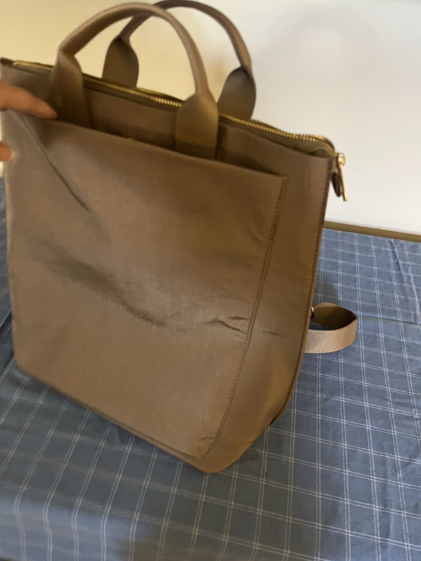 Stylish brown tote bag backpack
