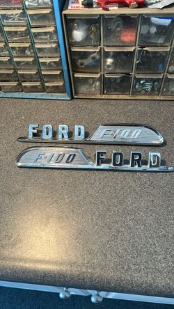 1957 Ford F100 hood emblems Nice Condition