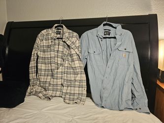 2 Size M Carhartt Shirt Long Sleeve.  $25  Each 