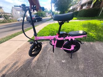 New pink electric bike 20 mph 30 mile range minimum ebike West huntington