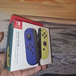 Nintendo Switch Joy Cons Blue And Yellow Neon 