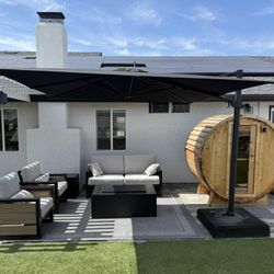 TREASURE GARDENS 10’ SQUARE CANTILEVER UMBRELLA - BLACK  400 lb ROLLING BASE - EASILY LOCK AND UNLOCK BASE BY STEPPING ON BASE TRIGGER.   COLOR: BLACK