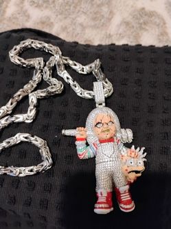 A beautiful iced out Chucky for sale