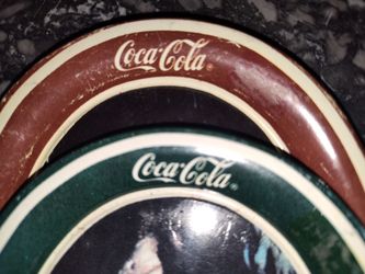 2 Coca cola metal coaster size trays from 1980s