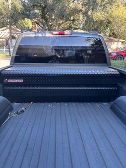Truck bed tool box