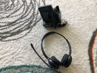 The Plantronics Savi W720 wireless Bluetooth headset system