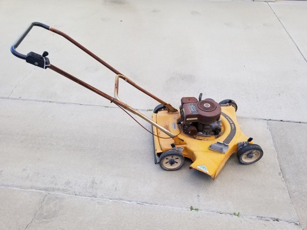 Vintage Montgomery Ward's Briggs & Stratton motor gas powered lawn mower made in the USA