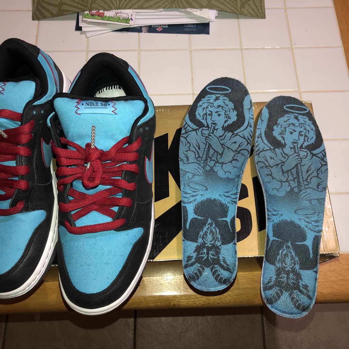 Nike sb dunk low angels and demons sale