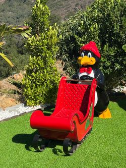 Life-Size Fiberglass Penguin with Christmas Sleigh Holiday Decor