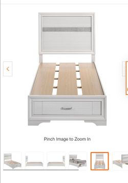 White twin bed with end drawer and mattress