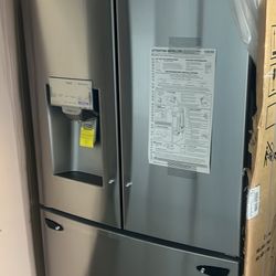 NEW IN BOX LG FRENCH STYLE STAINLESS STEEL REFRIGERATOR 