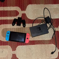  Nintendo Switch with Neon Blue and Neon Red Joy-Con