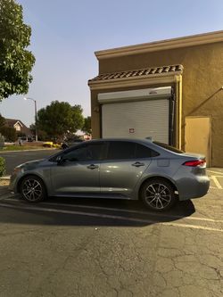 Salvage 2021 Toyota Corolla Sedan Gray