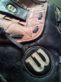 Baseball Gloves.  OneWilson One franklin  Softball Glovesll. $25 each
