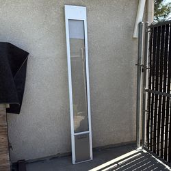 Doggie door for patio slider