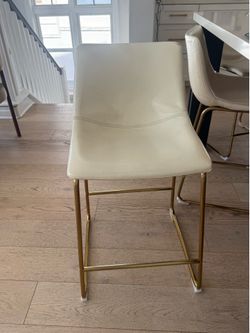 Set a four off white Vegan leather barstools
