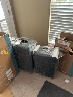 2 luggage sets for sale size 24/20 brand new