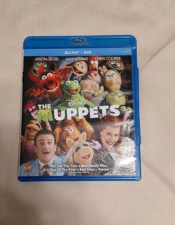 Brand new  disney Muppets blu- ray movie ( only watch 1 time ).