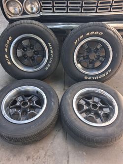 14" cutlass  wheels 5x4.75