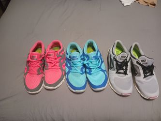 Three Pairs Of Women Nikes