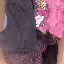 Box Full Of Clothes And Shoes