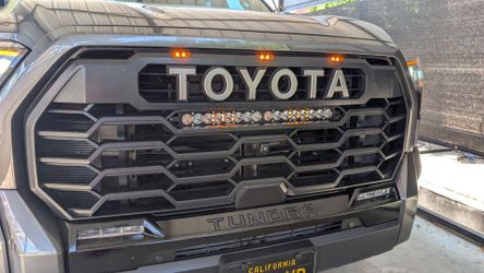 OEM 22+ Toyota Tundra TRD Pro Grill w/ Indicators and Baja Designs S8 20" Combo Spot