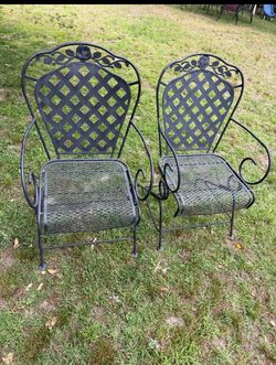 Two Wrought Iron outdoor chairs