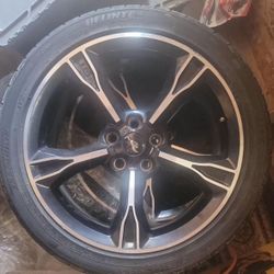 Ford mustang rim and tire
