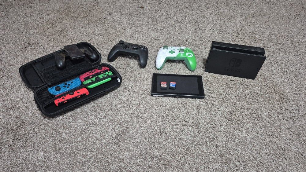 Nintendo Switch Bundle Including Pro Controllers, Joy-cons, Base, & Two Games