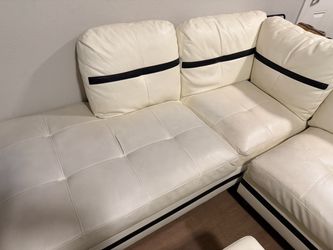 Beesley 103.5" Wide Faux Leather Sofa & Chaise with Ottoman