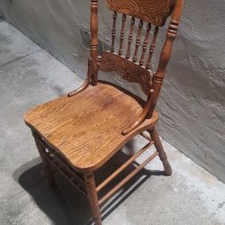 Four Solid Oak Chairs
