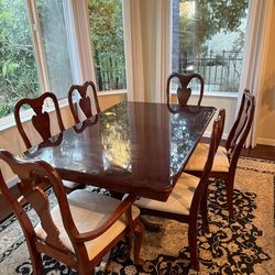 Mahogany dining table and chairs