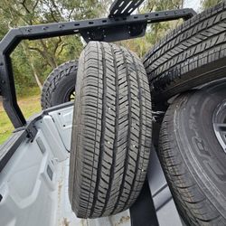 5 Stock Rims With Tires
