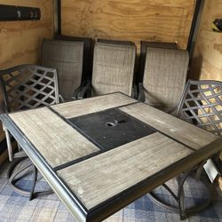 Table And 2  Swivels Chairs  $225.00