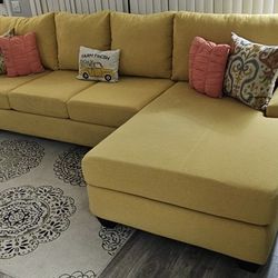 Like new! LIVING SPACES large yellow sectional sofa, 2 pieces, 124" x 68", excellent condition! All covers are removable for washing. I can deliver fo