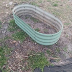 Frame for a raised planter