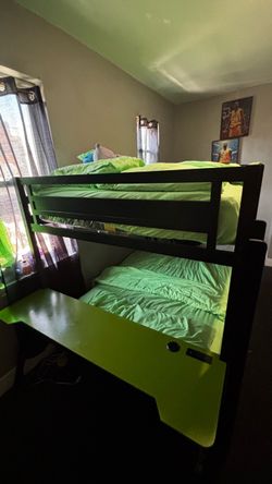 Bed with two gaming tables on the end of both side of bed