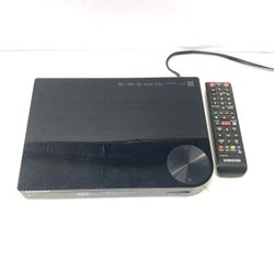 Samsung BD-5700 Blu-ray Disc & DVD player with Wi-Fi. 1080p Full HD with HDMI and USB port. Includes original remote control. Located @ Oakey&Decatur 