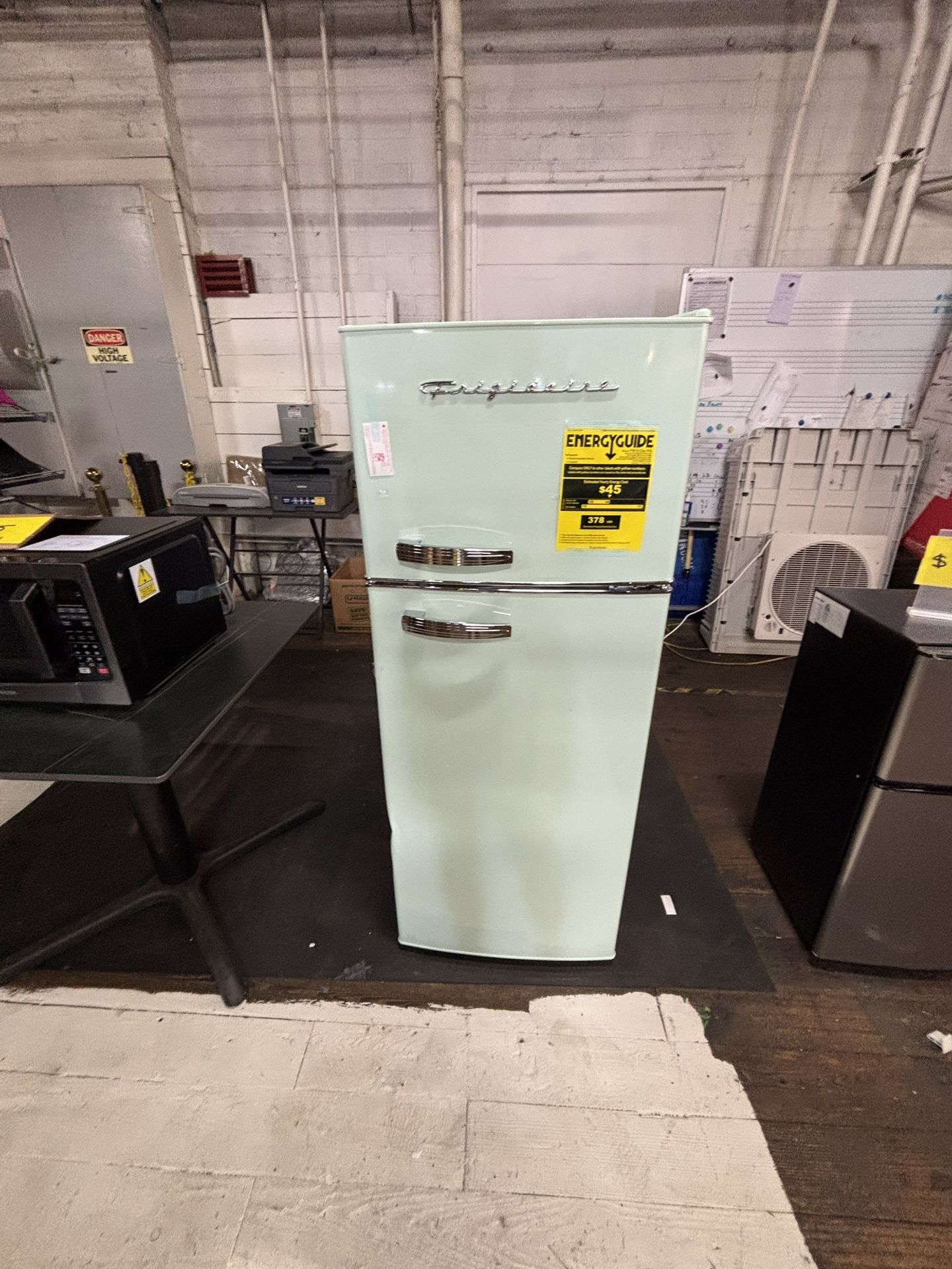 Brand new teal antique fridge