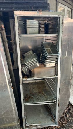 Enclosed sheet pan rack