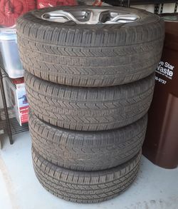 Four 275/60R20 Cooper Endeavor Plus Tires on OEM Ram 20 inch Wheels