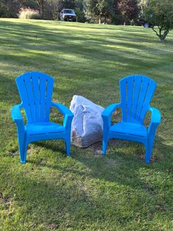 Blue Stackable plastic resin lawn chairs both for $25