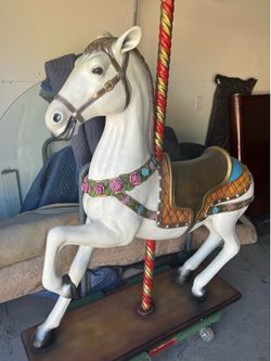 Carousel horse statute