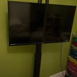 Smart TV (Roku) And Tv Stand
