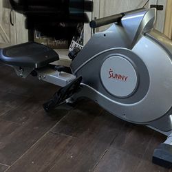 EXERCISE ROWER, ROWING MACHINE