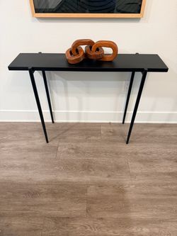 Black metal console entryway table