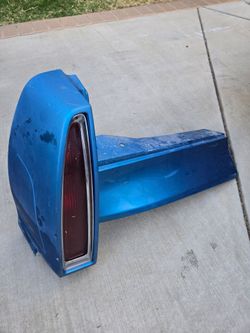 1(contact info removed) Cadillac Fleetwood Left Tail Light W/ Filler Panel