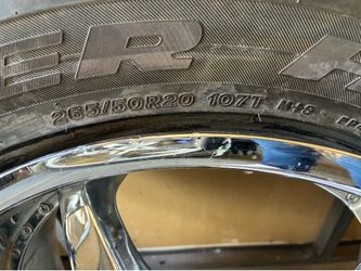 Milanni 20” Chrome Wheels w/ Bridgestone Dueler H/L Tires (Pair) - Denver Description: For sale: Pair of Milanni 20” chrome rims mounted on excellent 