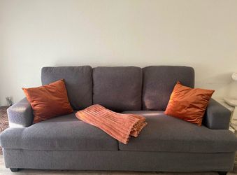 Grey deep cushion couch