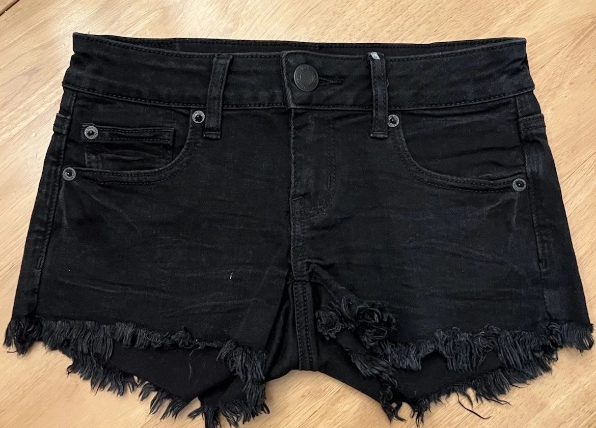 American Eagle Outfitters Super Stretch Super Low Shortie Size 0. Black W/Fringe